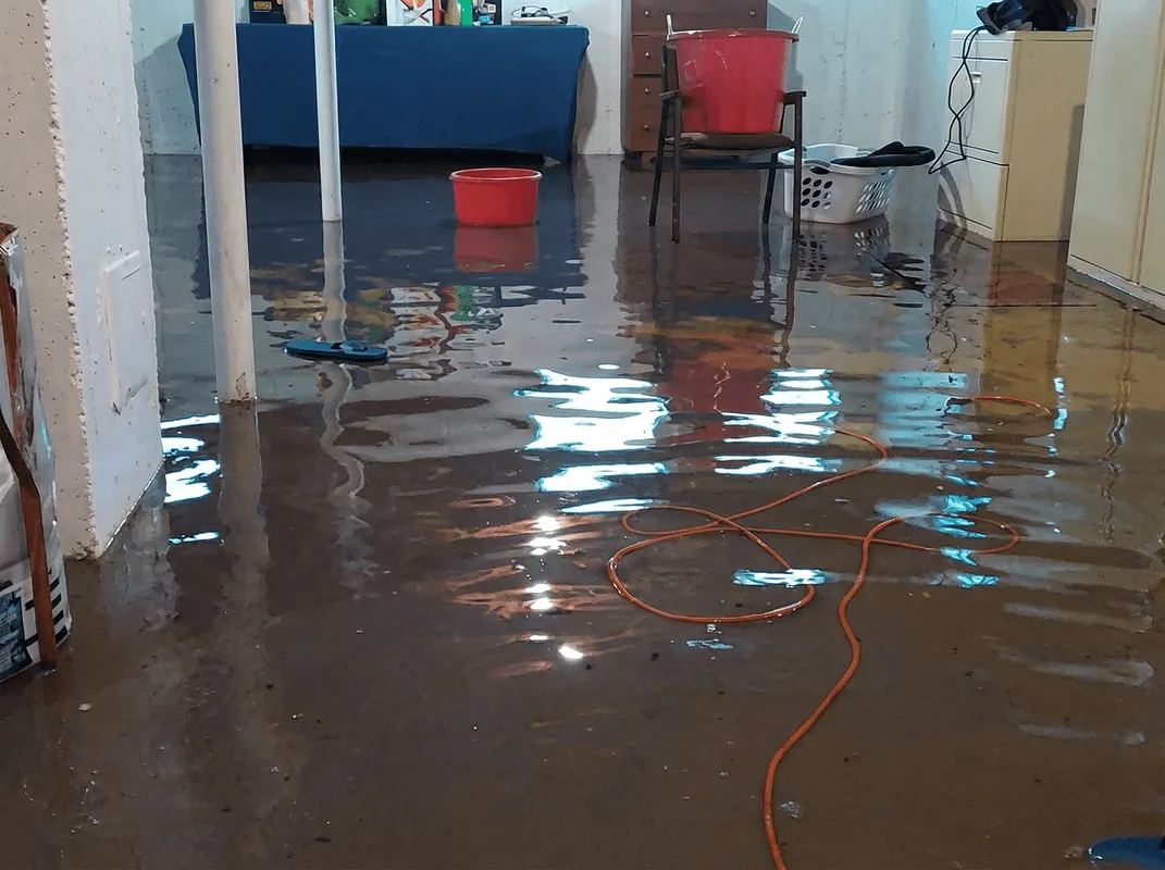 Basement with boiler, cabinets and washing machine completely flooded in Providence, RI